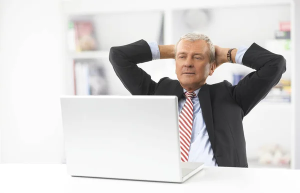 Shot Relaxed Senior Businessman Sitting Laptop Office — Stock Photo, Image