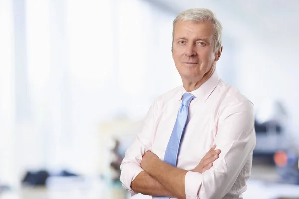 Close Portrait Senior Businessman Standing Arms Crossed Office While Looking — Stock Photo, Image
