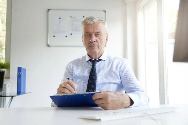 Portrait Senior Businessman Sitting Office Desk Doing Some Paperwork — Stock Photo, Image
