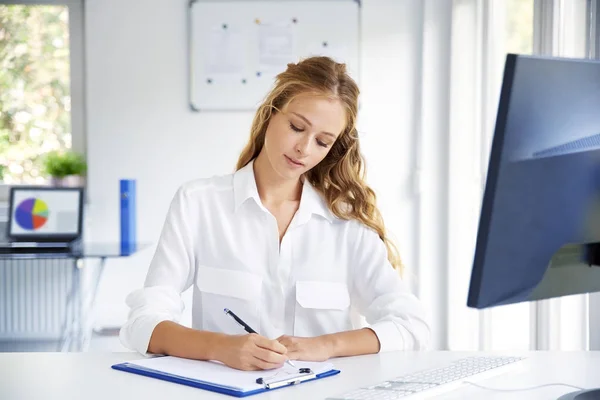 Beautiful Young Woman Making Notes While Sitting Office Desk Front — Stock Photo, Image