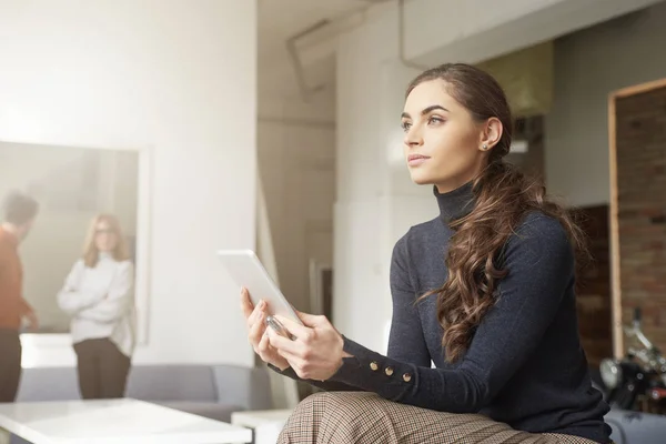 Thinking Young Sales Woman Holding Digital Tablet Her Hand While — Stock Photo, Image