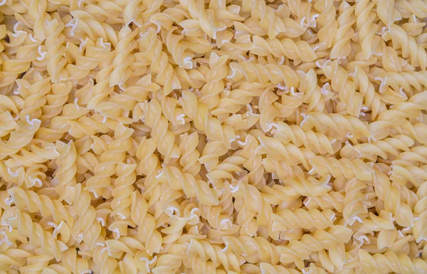 Pasta Fusilli Como Fondo Textura —  Fotos de Stock