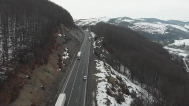 Sky view in mountin, winter road car 4K