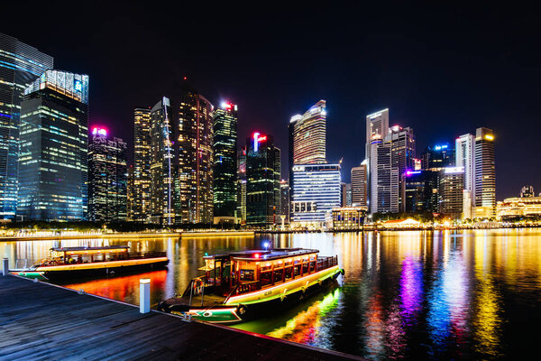 Marina Bay, Singapore - November 25 2019 - View of Singapore skyline around Central Area and Downtown in the hours of early evening