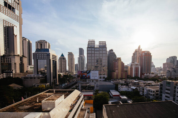 Bangkok, Thailand - April 26 2018: Skyscraper view across Silom district with late afternoon light in Bangkok, Thailand