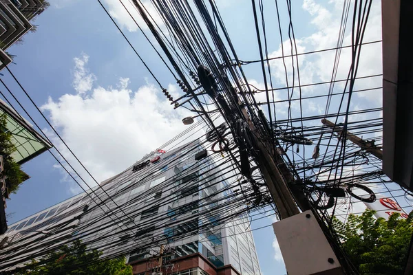 Crowded Power Pole in Thailand
