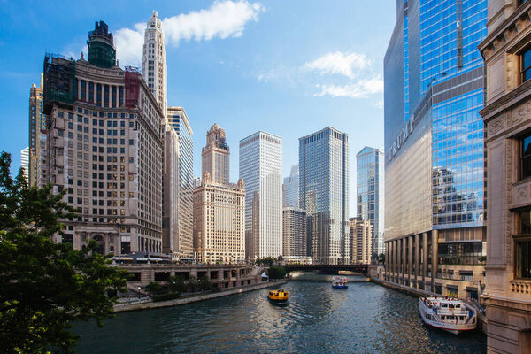 Chicago, USA - July 8th 2014: The day time view of Chicago River and surrounding buildings from the Wrigley Building and N Michigan Avenue