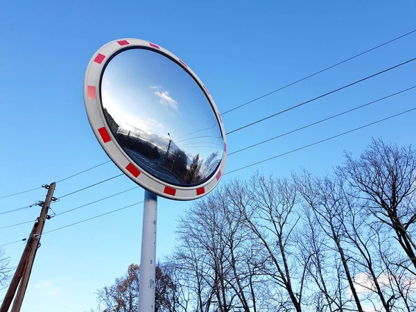 Road convex mirror traffic sign — Stock Photo, Image