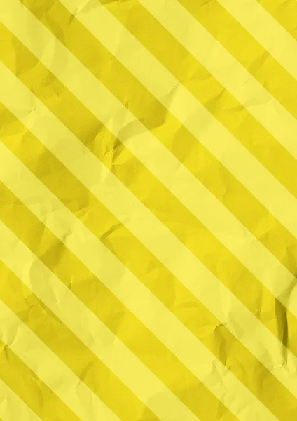 Striped folded paper yellow background. — Stock Photo, Image