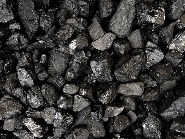 Natural black coals background texture. Top view of fuel for ind