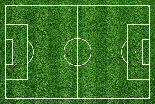 Вид сверху на футбольное поле или зеленый газон футбольного поля — стоковое фото