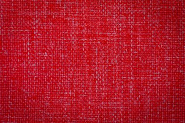 Arkaplan için kırmızı soyut kumaş dokusu.
