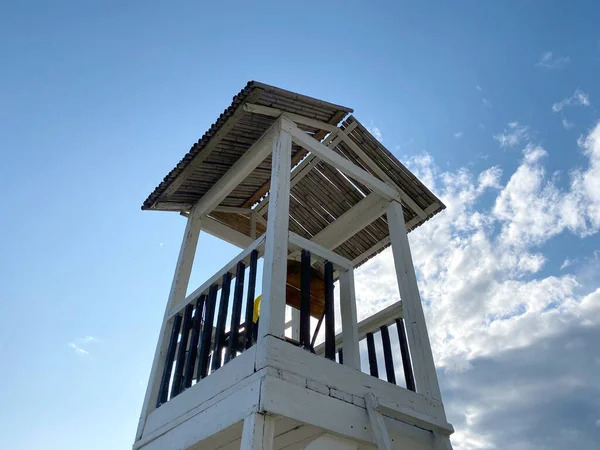 Lifeguard tower on the beach at sunset time — Stock Photo, Image