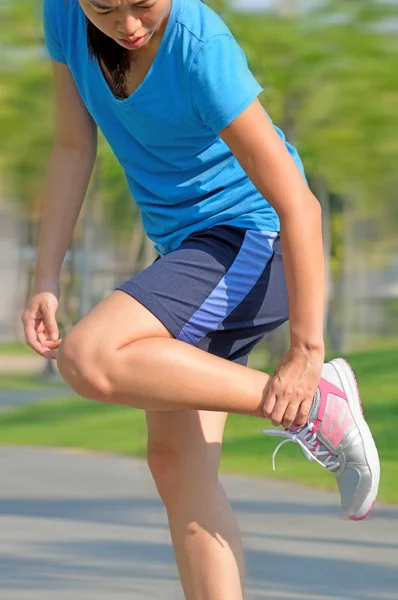 Woman Trail Runner Hold Her Sports Injured Ankle — Stock Photo, Image