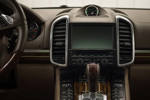 Modern car dashboard. Screen multimedia. Interior detail.