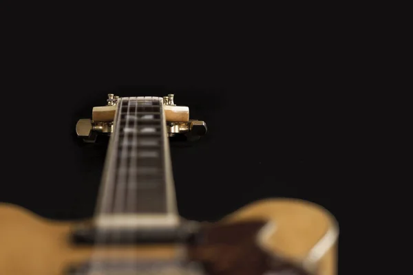 Vintage archtop guitar in natural maple close-up high angle view — Stock Photo, Image