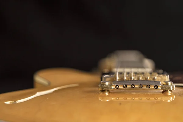 Vintage archtop guitar in natural maple close-up high angle view — Stock Photo, Image