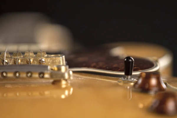 Vintage archtop guitar in natural maple close-up high angle view — Stock Photo, Image