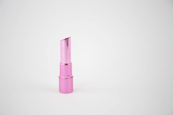 Stop Motion Animation Pink Lipstick Stick Opens Closes Itself White — Stock Video