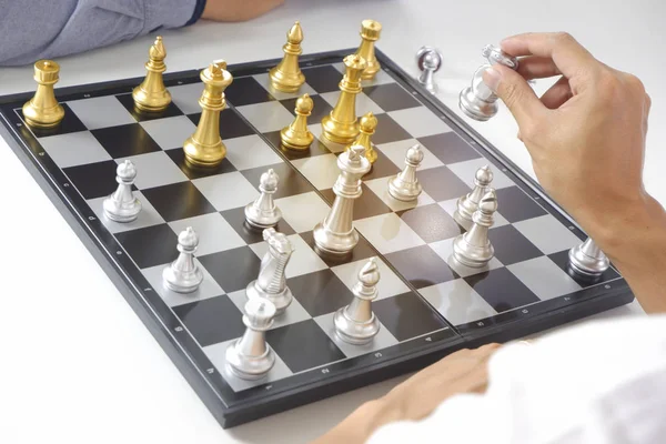 Businessman playing chess game; for business strategy, leadershi