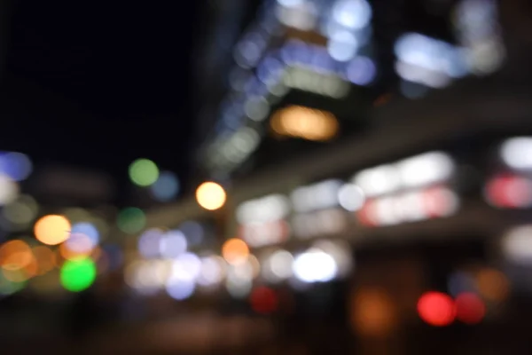 Cidade borrada luz noturna defocus cityscape . — Fotografia de Stock