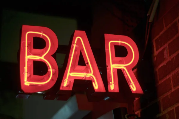 Red illuminated neon BAR sign