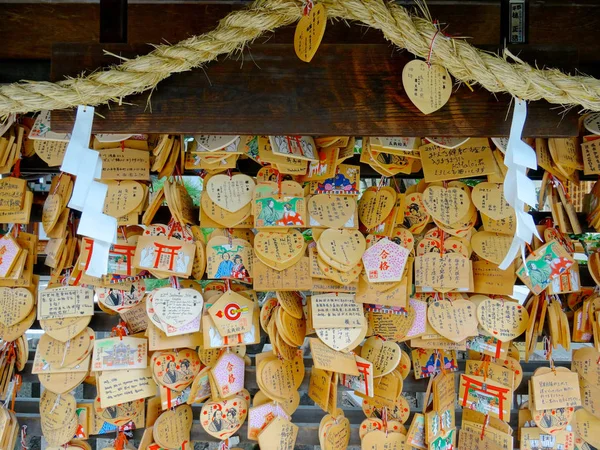Wooden votive plaque (Ema's) hanging at Tsuyunoten Shrine — Stock Photo, Image
