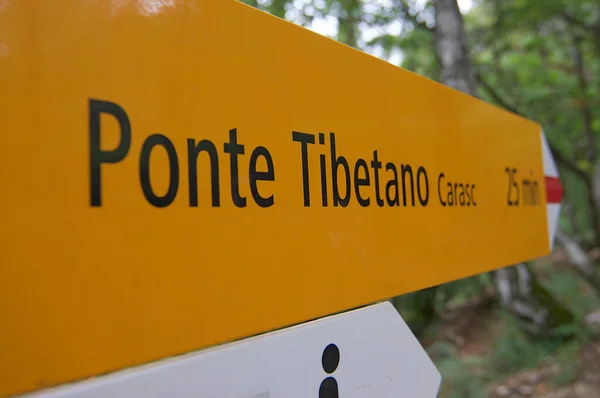 Hiking sign of the Ponte Tibetano locataed on the way to the famous tibetan suspension bridge in the region of Ticino, Switzerland