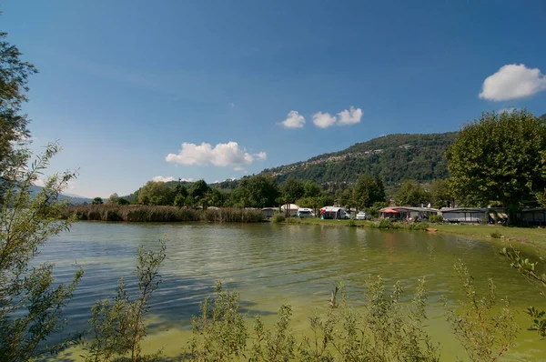 View on the gulf of a Agno and a campsite located in the Ticino Canton, Switzerland
