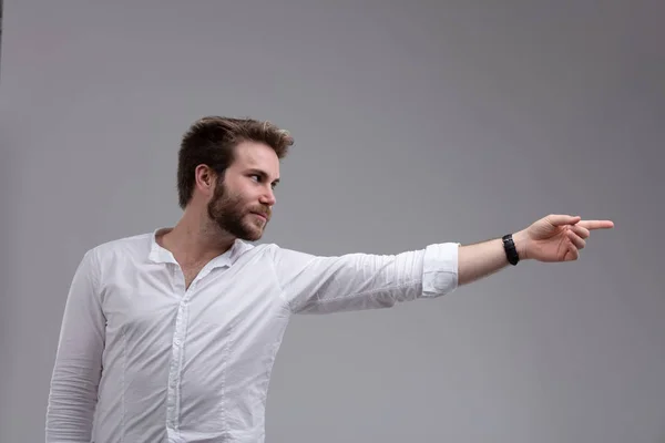 Attractive Bearded Man Pointing Side Outstretched Arm Isolated Grey Copy — Stock Photo, Image