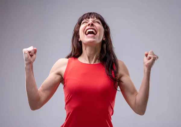 Excited Woman Celebrating Clenched Fists Her Head Thrown Back Yelling — Stock Photo, Image