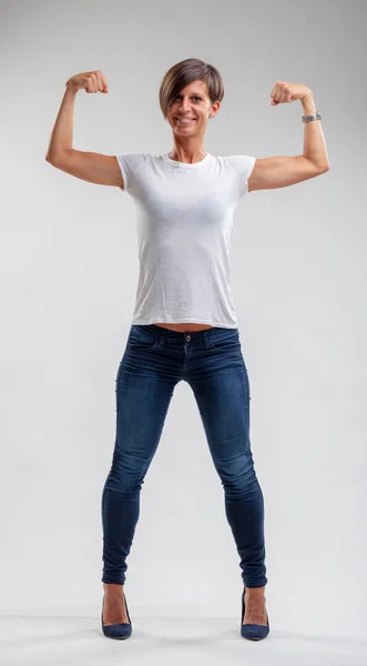 Muscular Fit Woman Flexing Her Muscles Happy Confident Smile She — Stock Photo, Image