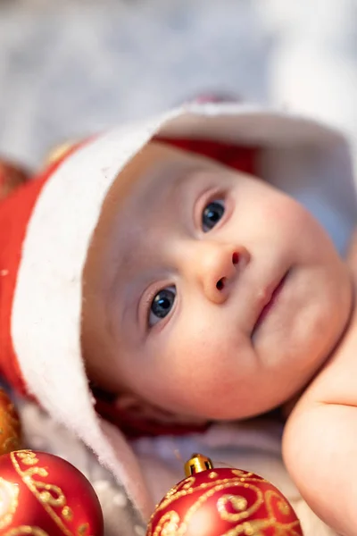 Newborn Baby Wearing Santa Hat Christmas Baubles Lying Its Cot — Stock Photo, Image