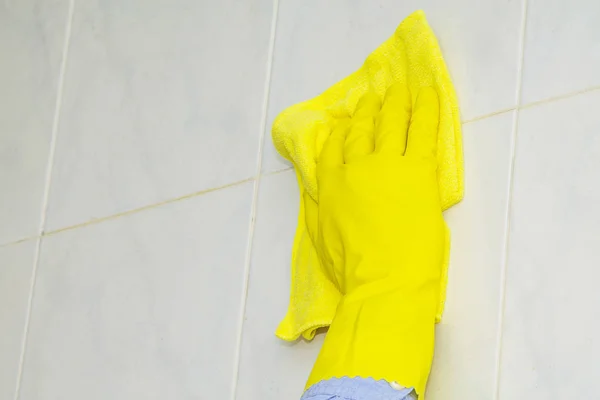 cleaning tiles with cleaning products and disinfectants