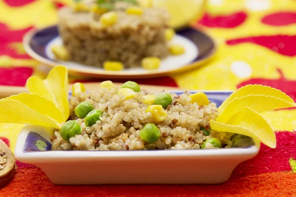 Quinoa salad with corn and peas