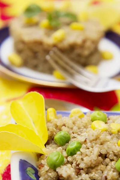 Quinoa salad with corn and peas