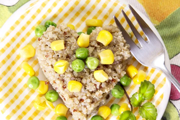 Quinoa salad with corn and peas