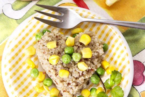 Quinoa salad with corn and peas