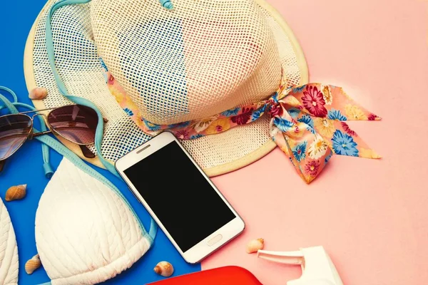 mobile phone and tourism accessories. summer vacation concept