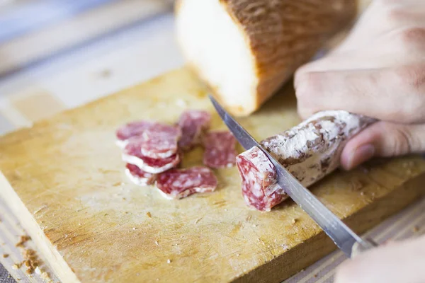 Cutting Delicious Sausage Wooden Board — Stock Photo, Image