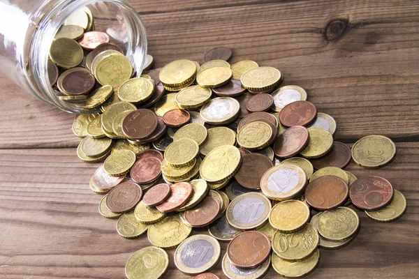 Jar Coins Scattered Table — Stock Photo, Image