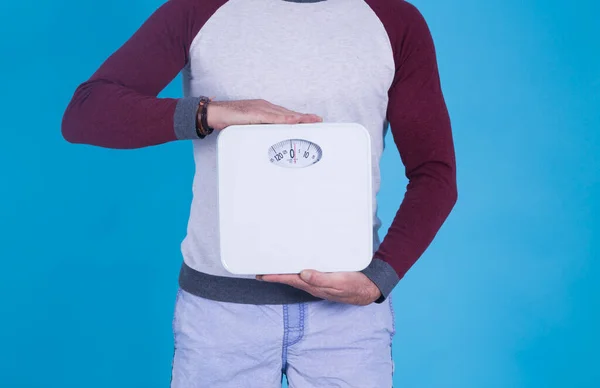 Man Holding Scale Diet Food Concept — Stock fotografie