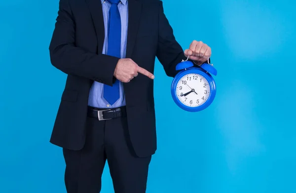 Businessman Pointing Alarm Clock His Finger — Stock Photo, Image