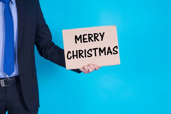 Hombre Negocios Con Saludo Navideño Mano —  Fotos de Stock