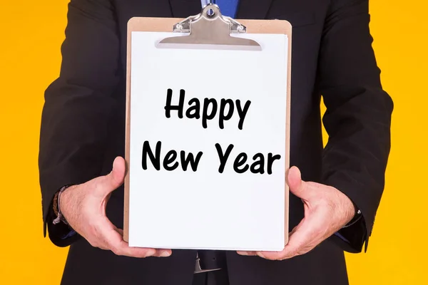 Geschäftsmann Mit Fröhlichem Neujahrsbanner Der Hand — Stockfoto