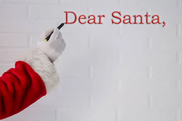 Weihnachtsmann Schreibt Weihnachtsgeschenkliste — Stockfoto