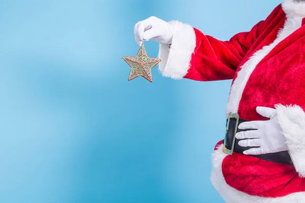 Santa Claus Vánoční Hvězdou Ruce — Stock fotografie