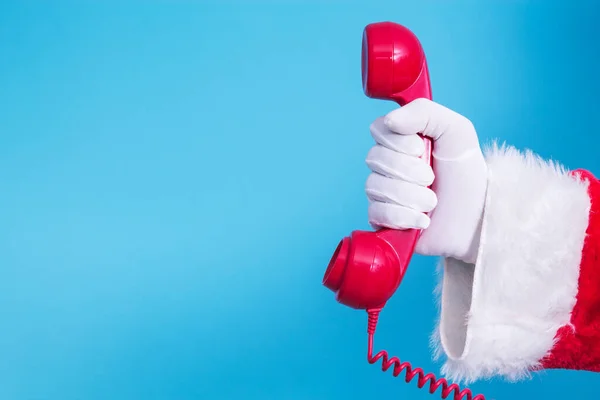 Babbo Natale Possesso Telefono Rosso Con Sfondo Blu — Foto Stock