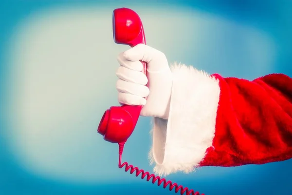 Papai Noel Segurando Telefone Vermelho — Fotografia de Stock