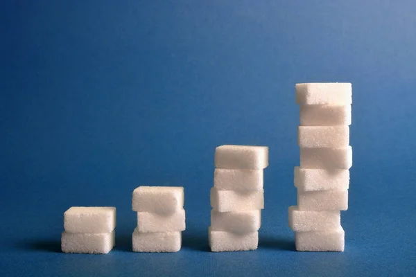 Paquets de cubes de sucre en forme de diagramme . — Photo